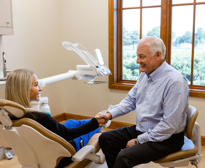 Dr. Damon Johnson, DDS with dental patient Edmond, Ok